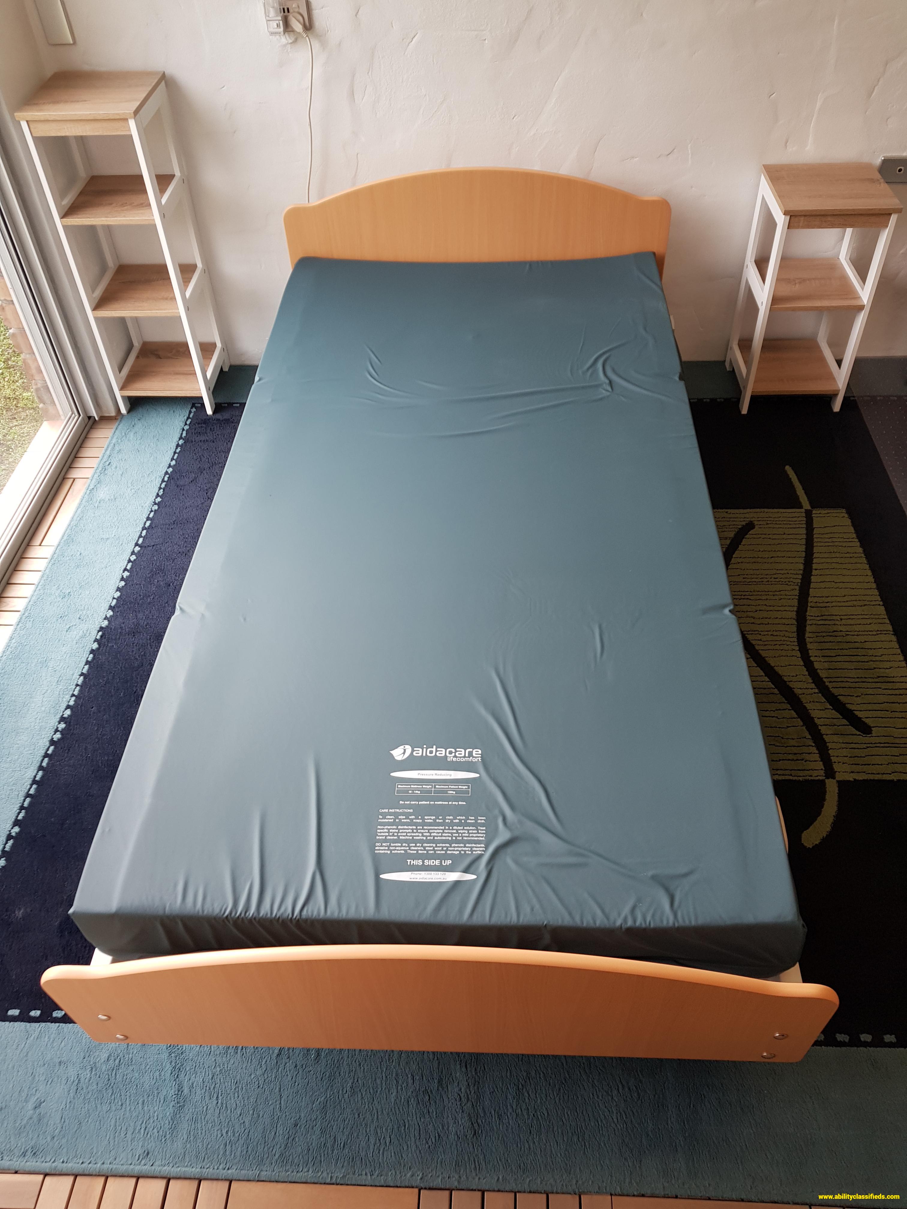 AIDACARE 3 FUNCTION HIGH/LOW AGED CARE BED + MATTRESS