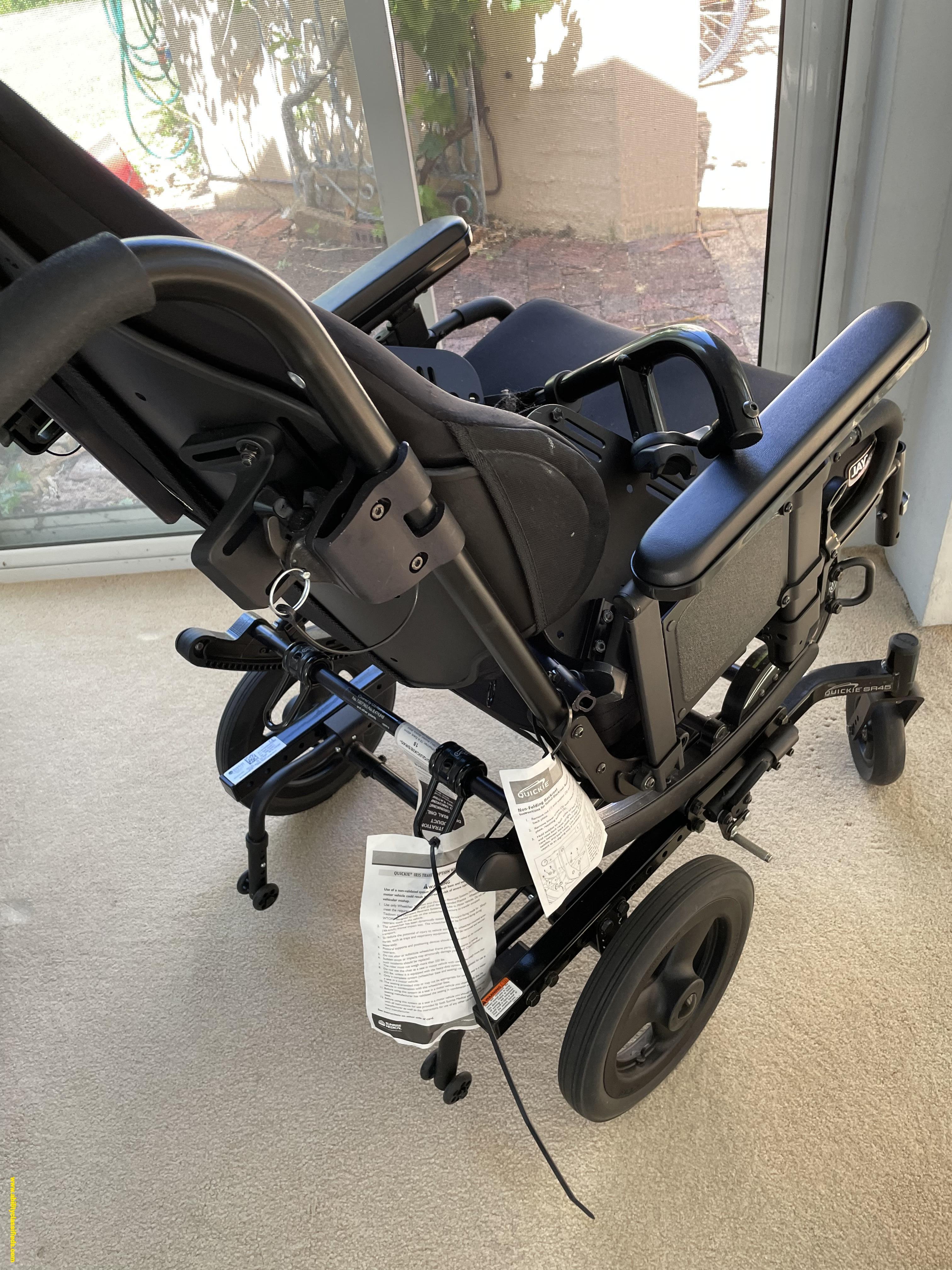 Tilt in space wheelchair