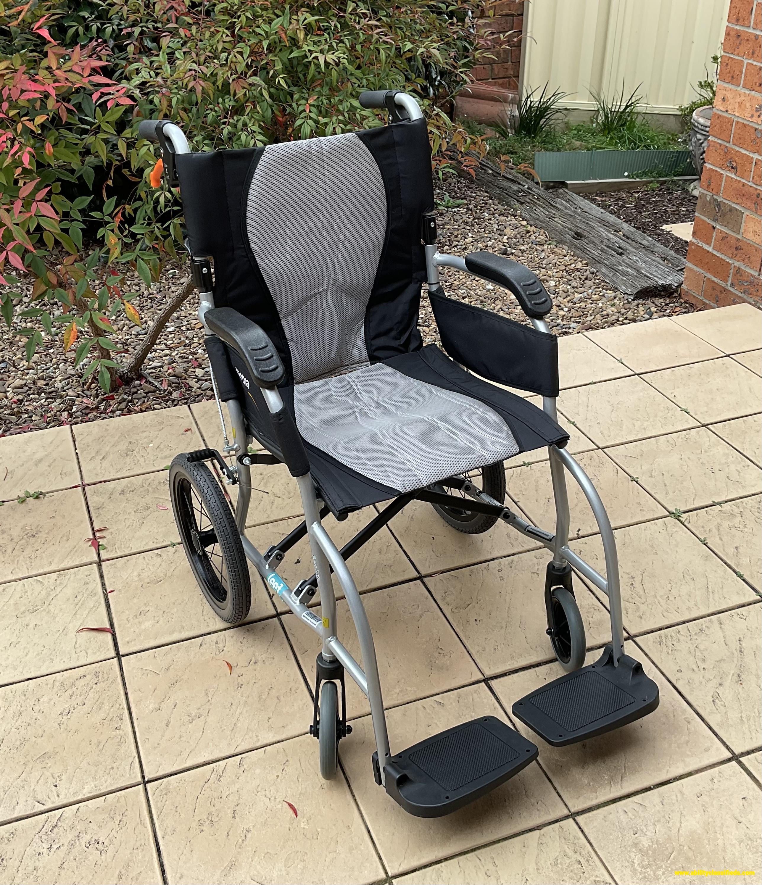 Karma ErgoLite Assistant-Propelled travel wheelchair