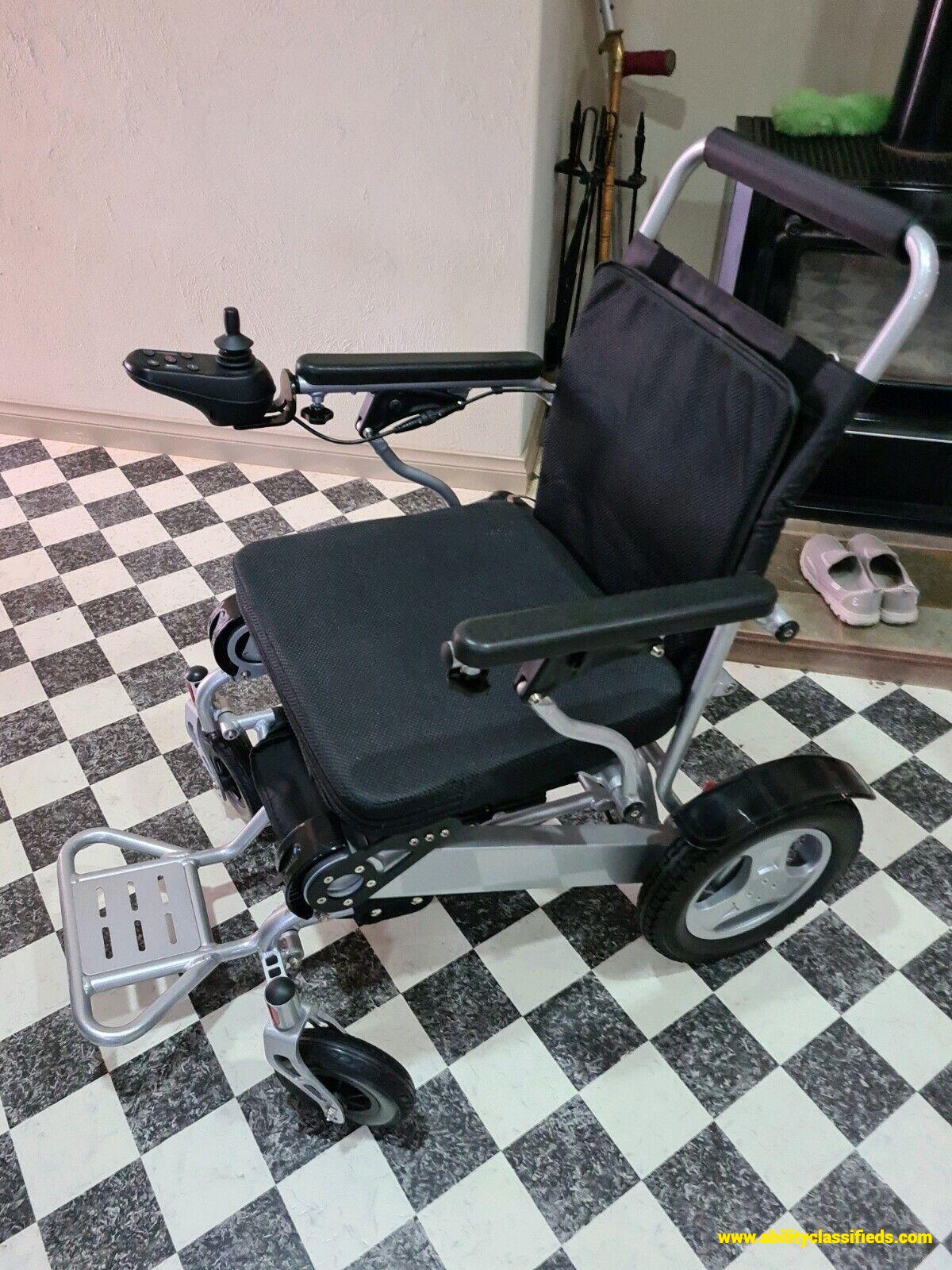 Portable electric wheelchair Brand New 