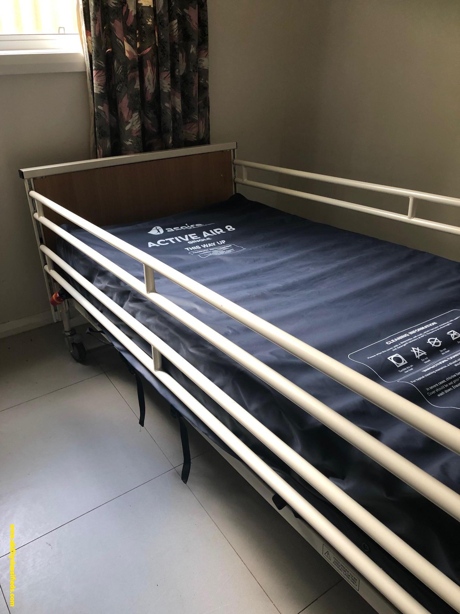 Hospital style bed and air mattress