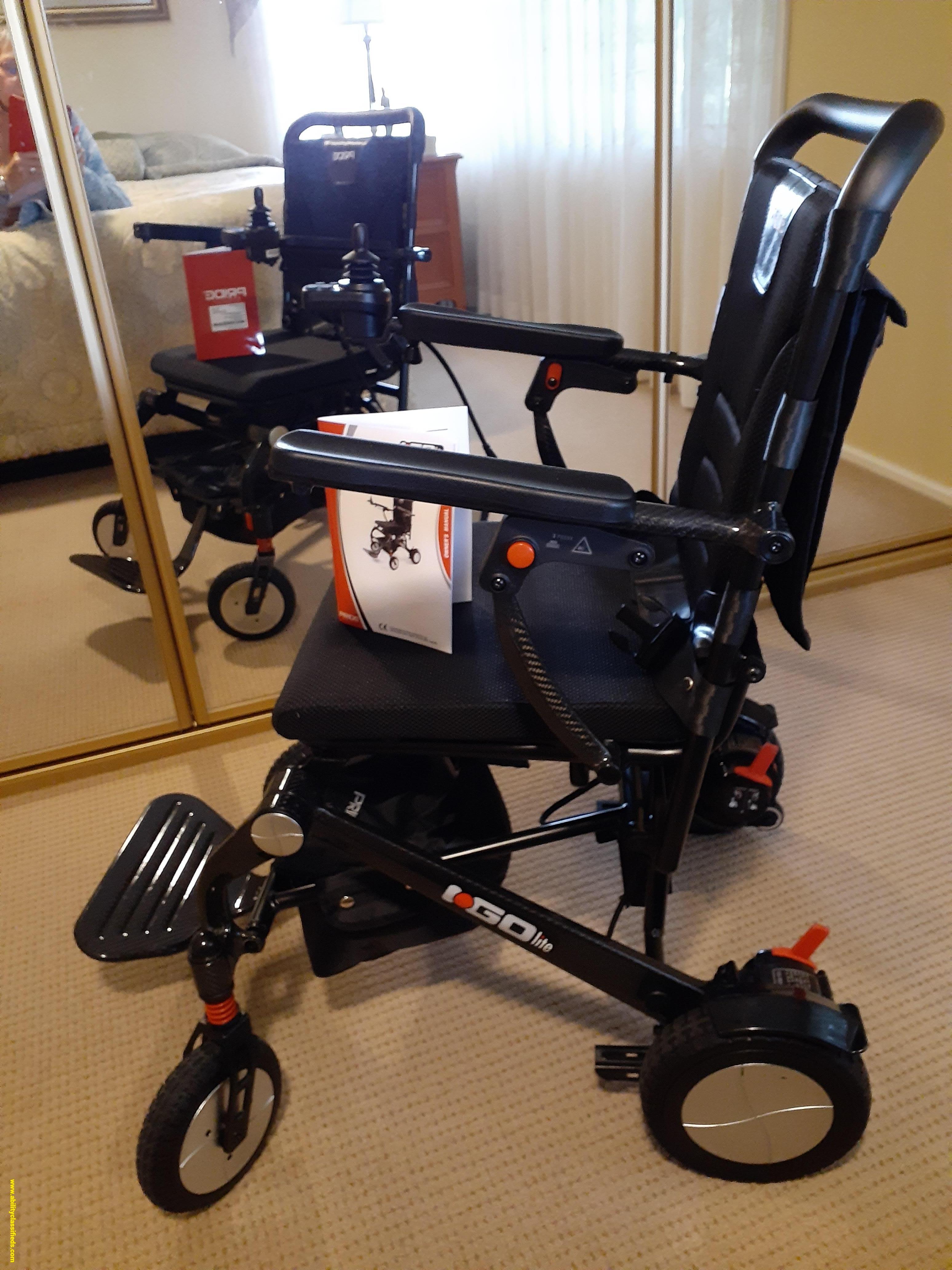 Light Weight Carbon Fibre Folding Motorised Wheelchair