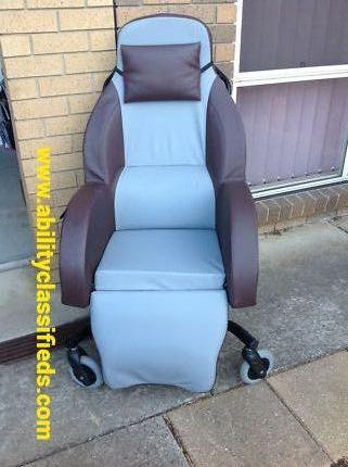 Aspire Shell reclining chair on wheels